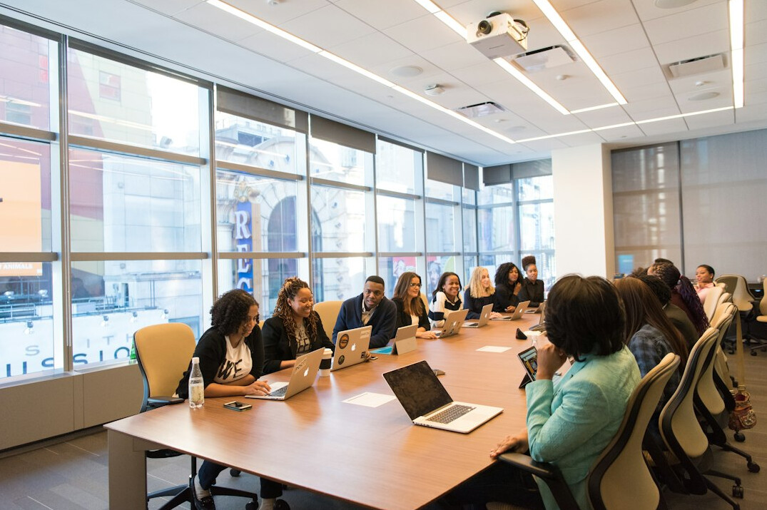 business leader in meeting