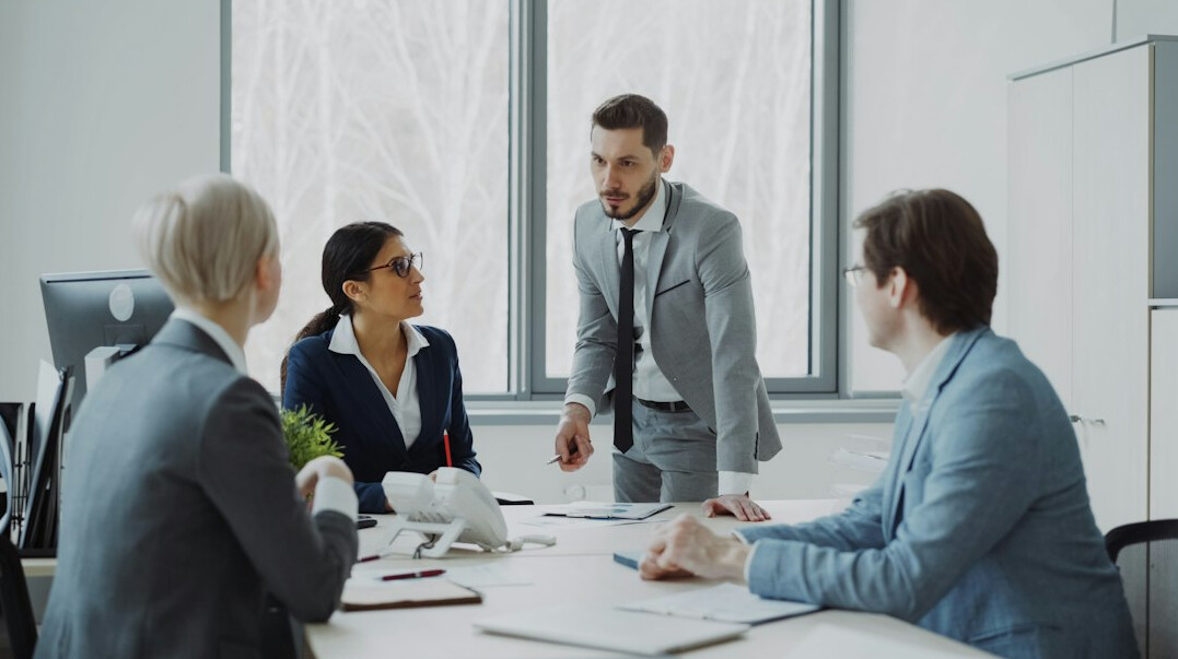 effective business leader guiding team